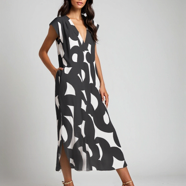 Frederika™ | Flydende kjole med V-hals